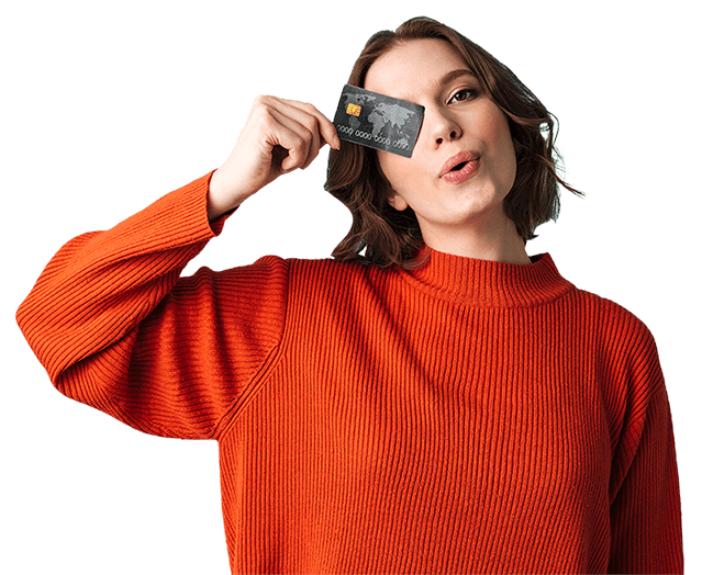 Woman Holding Up a Credit Card