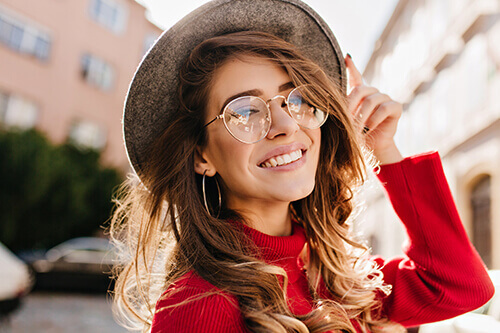Woman Wearing Glasses and Smiling